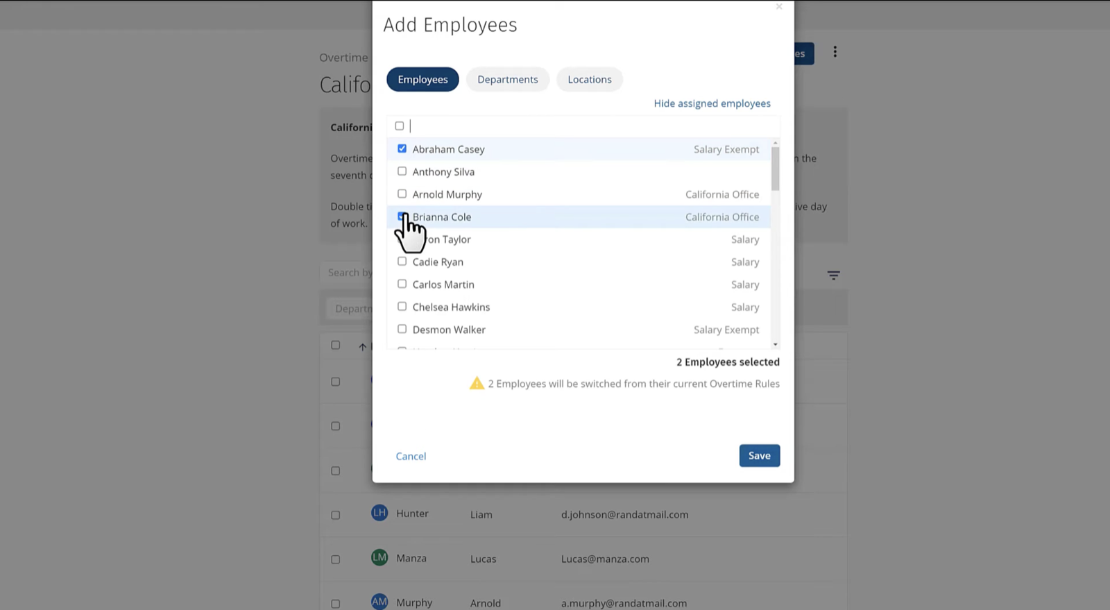 ClockShark employee assignment screen for overtime rules, warning that two selected employees will be switched from their current rules