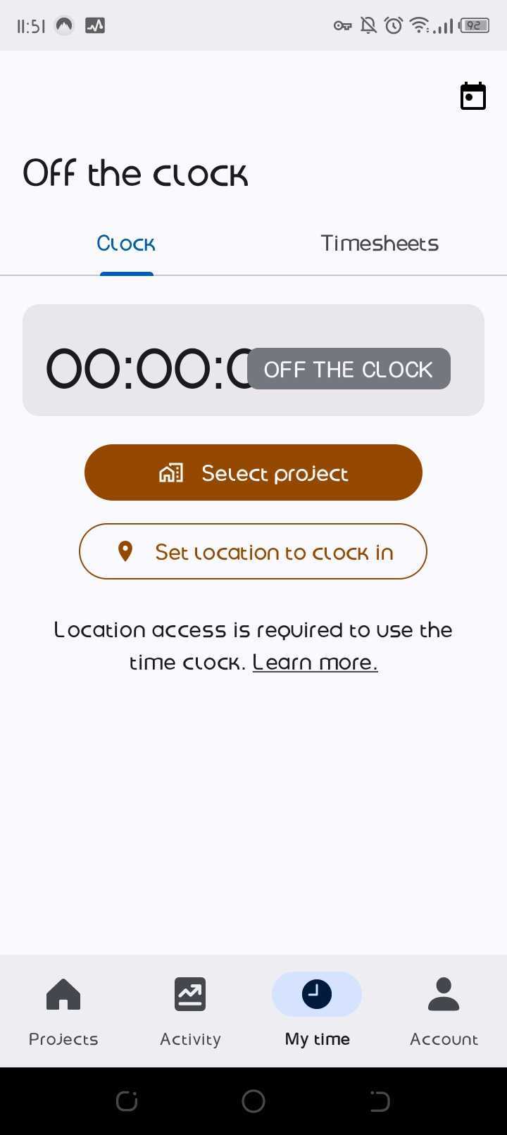 Raken mobile My time screen headed Off the clock, with Clock and Timesheets tabs, a zeroed timer, Select project and Set location to clock in buttons, and a notice reading Location access is required to use the time clock