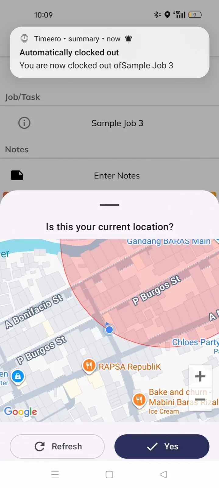 Timeero notification reading Automatically clocked out, You are now clocked out of Sample Job 3, over a map of the job area