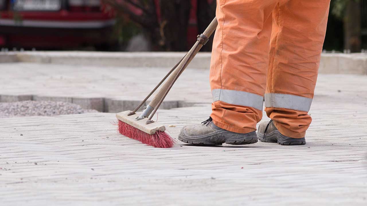 Cleaning work site.